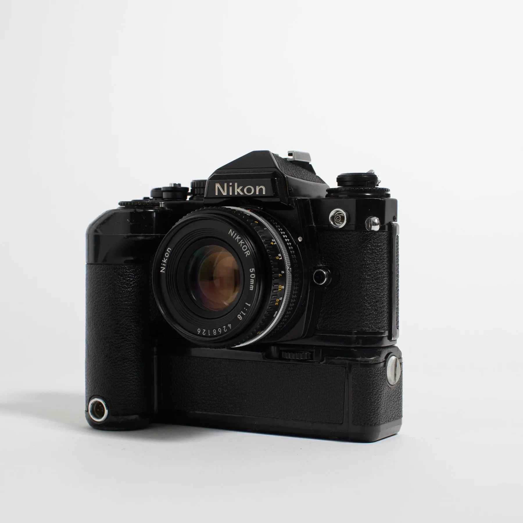 Nikon FE with 50mm f/1.8 lens and motor drive MD-11