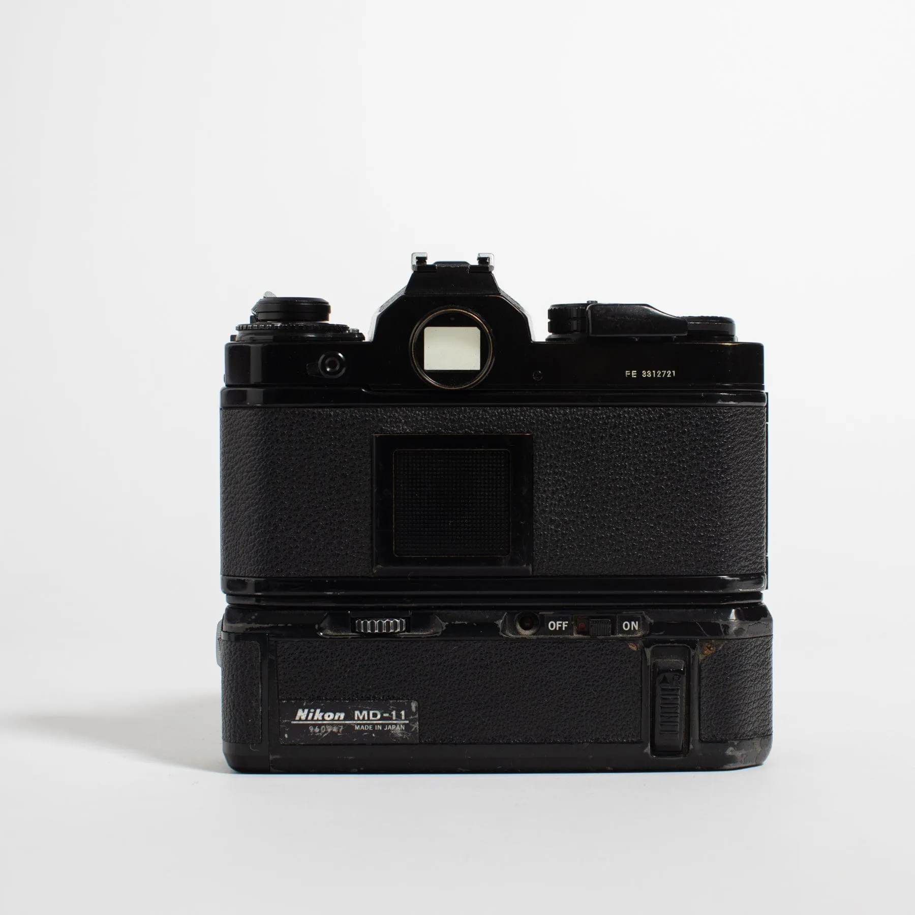 Nikon FE with 50mm f/1.8 lens and motor drive MD-11